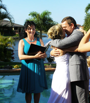 Atanas and Chantel kiss to seal their marriage at Monterey Keys on the Gold coast with Marilyn Verschuure as Wedding Celebrant